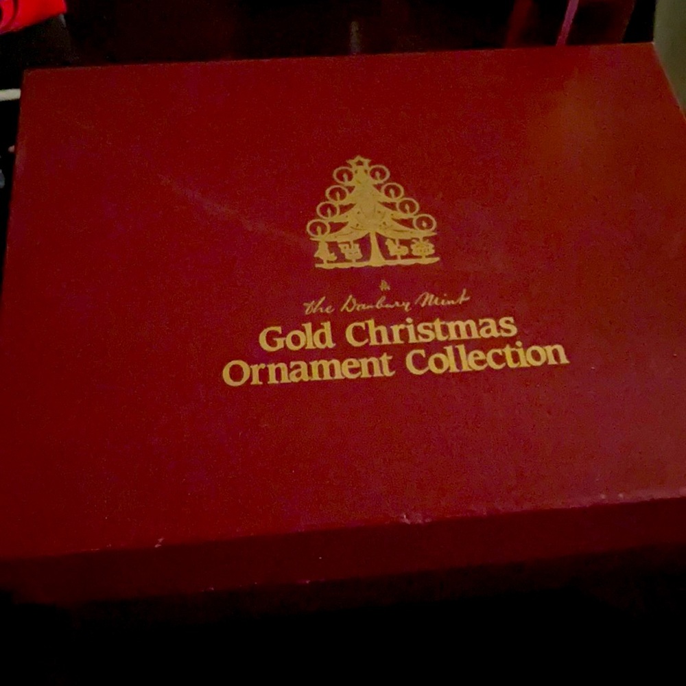 The Danbury mint gold Christmas ornament collection